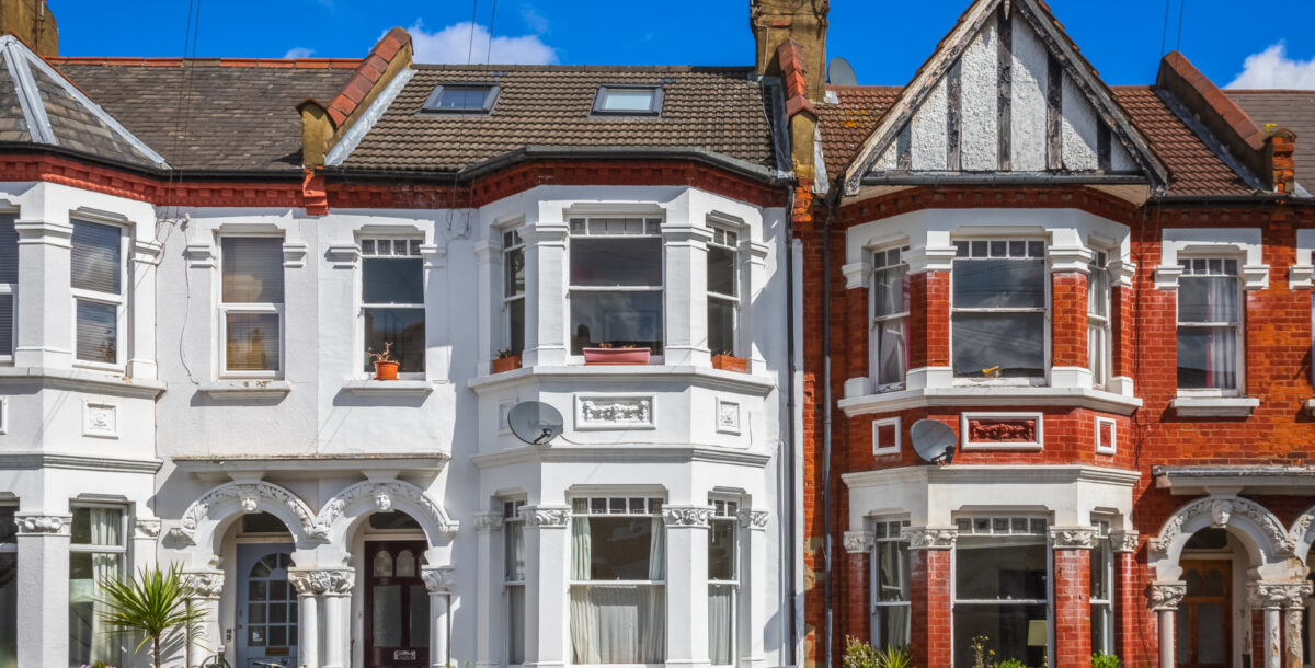 A row of Victorian terrace houses with two bays