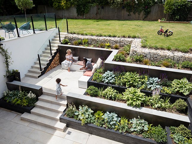 garden on a gradient with stairs and planters - home improvements - grand designs
