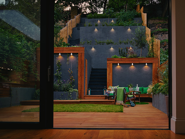 steep garden design with series of terraces in grey concrete - home improvements - grand designs