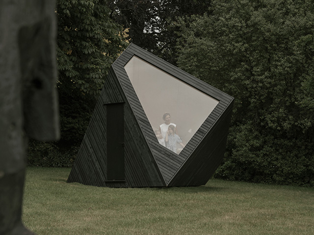 glazed side to charred wood work cabin - grand designs