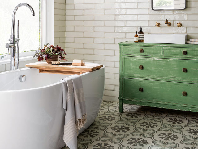 White tiles green drawer sink unit white freestanding bath wooden bath shelf red plant